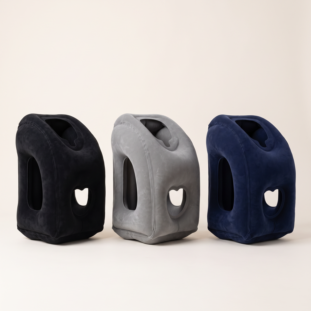 NapHug travel pillow in black, grey and blue